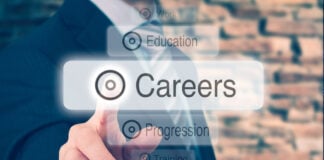 Hand touching virtual interface with Careers highlighted