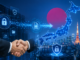 Kiteworks Acquires WAMNET Japan, Expanding Secure Data Exchange Control Plane Into Japan’s Enterprise Market Handshake, security icons, and a digital map