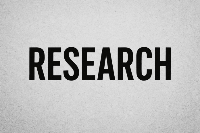 Bold black typography spelling RESEARCH on gray wall Bold black typography spelling RESEARCH on gray wall