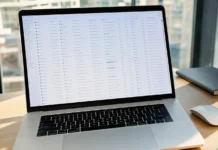 Jamf Survey: AI Depth Predicts Incidents While AI Governance Ranks Third A close-up of a MacBook Pro on a clean desk, displaying a spreadsheet in a bright modern office setting.