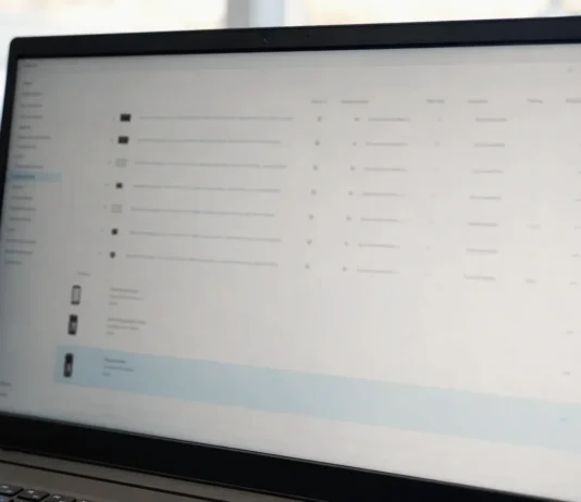 Helpdesk Impersonation: The Four Post-MFA Stages CISOs Need to Detect A laptop monitor displays a brightly lit authentication management