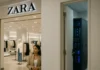 Zara Data Breach Exposes 197,400 Customers via Retired Provider Tokens A retail store entrance at twilight, with soft interior lighting and a dimly lit server rack visible through an open door.